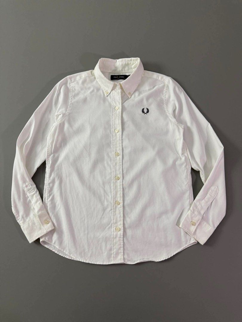FRED PERRY (Category: Formal Shirts) located in Guagua. Submitted by sweetboyy (Listing ID 1460846217, Image 1). Description: FRED PERRY EXCELLENT CONDITION / NO ISSUE SIZE 10 MEDIUM ON TAG / DIMES L26 W19.