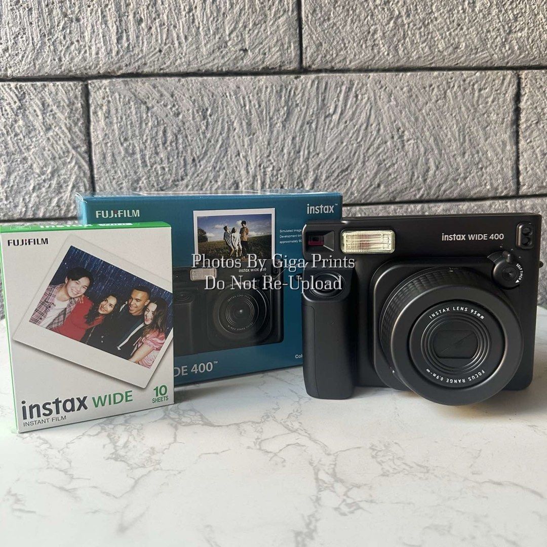 Fujifilm Instant Camera Wide 400 Jet Black (Category: Cameras) located in Quezon City. Submitted by bdsdc1998 (Listing ID 1460724551, Image 1). Description: FUJIFILM INSTAX WIDE 400 JET BLACK 🖤🖤🖤 SRP: 10,599 SALE PRICE: 9,499 🎁INCLUSIONS: -10 Sheets Wide Plain Film -Unit -Camera Angle Adjustment Accessory -Closeup Lens -Shoulder Strap -Batteries -Users Manual -Warranty Papers.