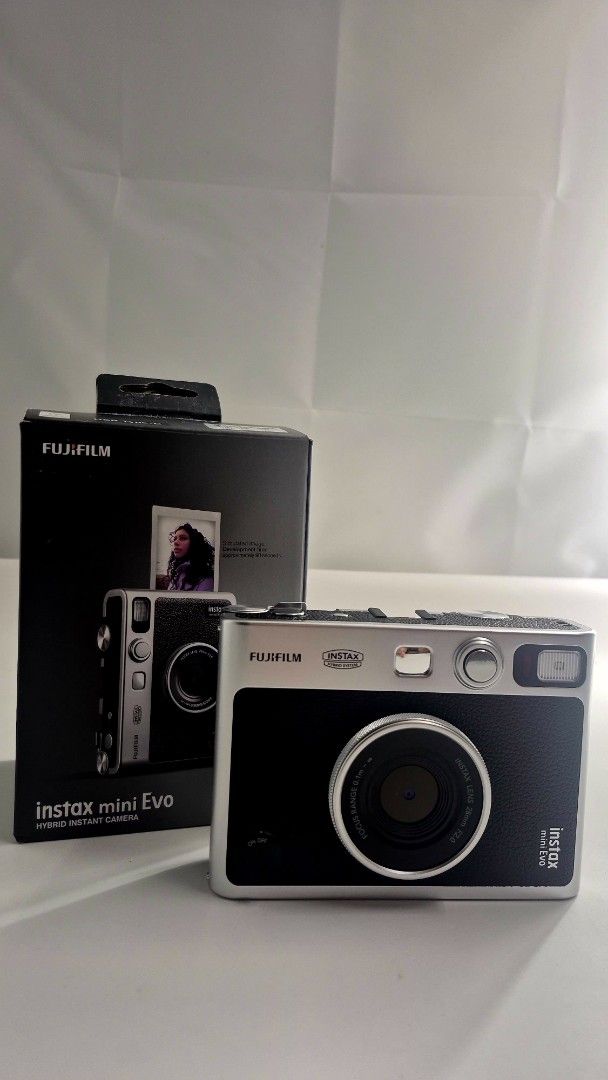 Fujifilm Instax Mini Evo Hybrid Instant Camera (Category: Cameras) located in Manila. Submitted by jeremiaha38234 (Listing ID 1460741328, Image 1). Description: FS: INSTAX MINI EVO BLACK ⭐️PHP 10K (BOUGHT IT FOR 12K SLIGHT NEGO IF GET TODAY) ⭐️Purchased last March 2026 ⭐️Used occassionally (di lalagpas sa 10 daliri) ⭐️In good condition INCLUSIONS: 🔆Original Box 🔆USB Charging Cable 🔆Transparent Case 🔆Brand New Lens Cap 🔆Original Strap LOC: NO