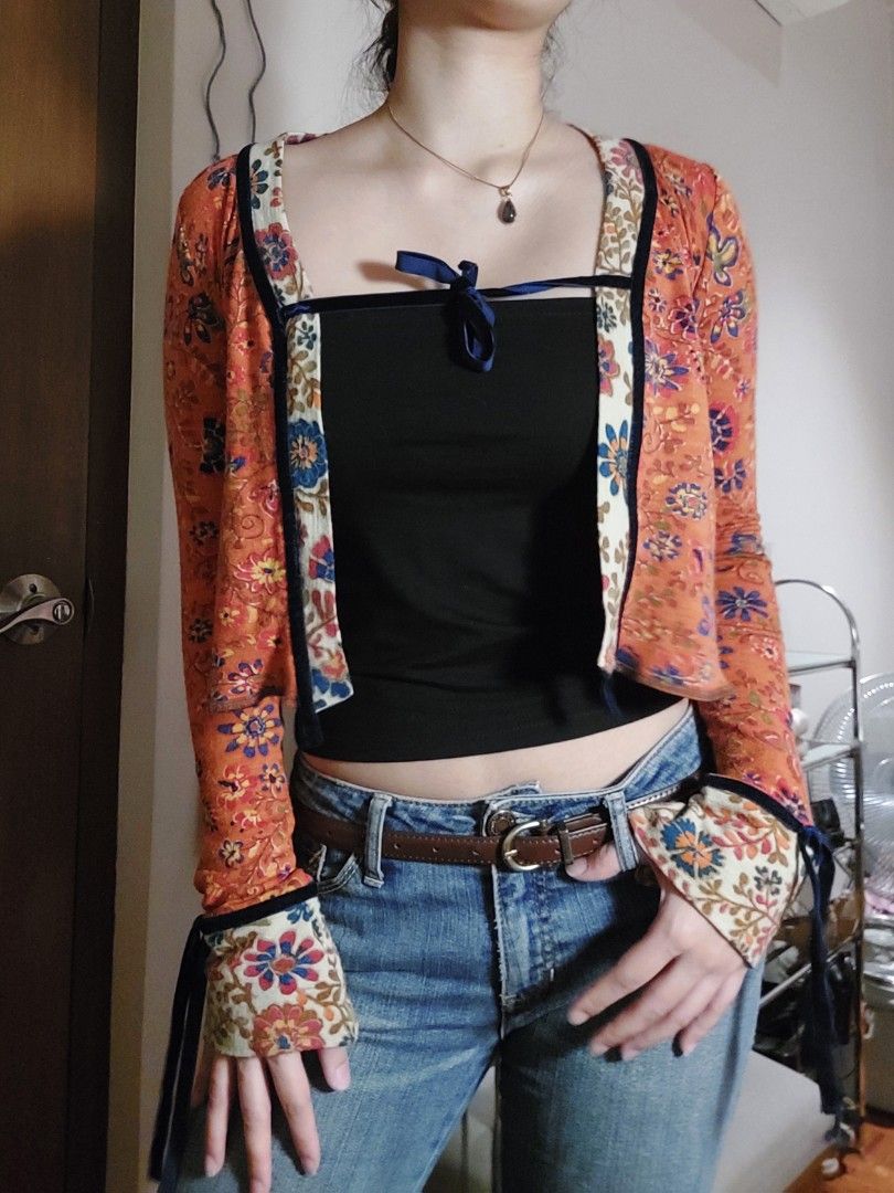 funky bolero (Category: Longsleeves) located in Quezon City. Submitted by _redbeanbun (Listing ID 1460882482, Image 1). Description: measurements (laid flat) length / 16" bust width / 14.5" - can be worn multiple ways! - love the velvet ribbons - quite a bit of pilling in the fabric I accept payment through bank transfer or gcash, and will ship out via gogoxpress! 🚀.