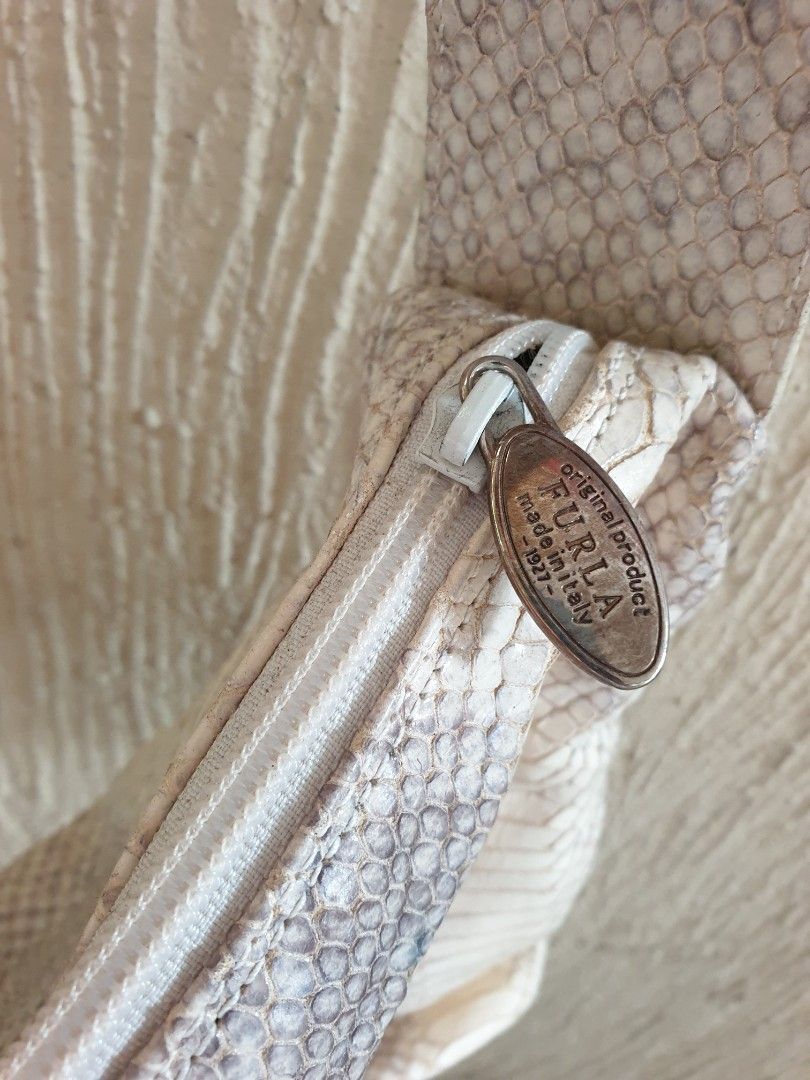 Furla Snake skin Shoulder Bag (Category: Shoulder Bags) located in Las Pinas. Submitted by anggesmart (Listing ID 1460869726, Image 3). Description: Preloved Furla Snake skin Shoulder Bag With minimal signs of usage, needs cleaning. With interior pockets with zipper & for cards.