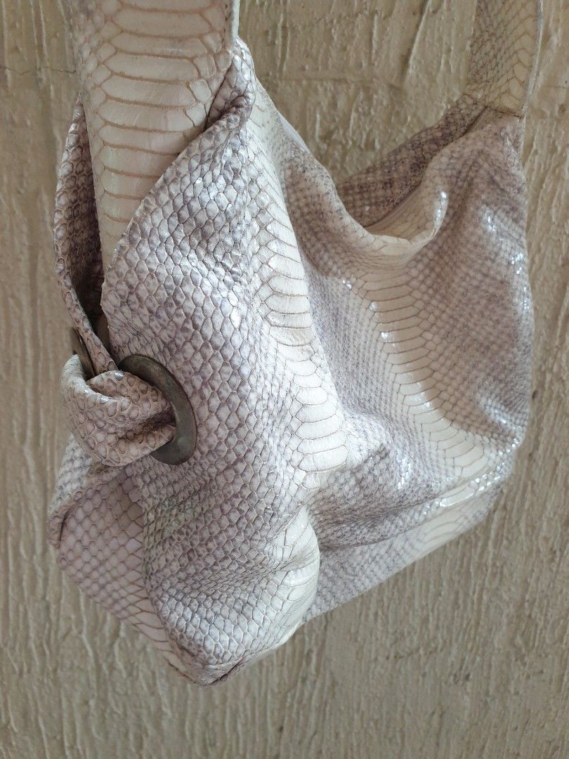 Furla Snake skin Shoulder Bag (Category: Shoulder Bags) located in Las Pinas. Submitted by anggesmart (Listing ID 1460869726, Image 2). Description: Preloved Furla Snake skin Shoulder Bag With minimal signs of usage, needs cleaning. With interior pockets with zipper & for cards.