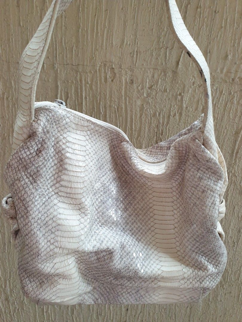 Furla Snake skin Shoulder Bag (Category: Shoulder Bags) located in Las Pinas. Submitted by anggesmart (Listing ID 1460869726, Image 1). Description: Preloved Furla Snake skin Shoulder Bag With minimal signs of usage, needs cleaning. With interior pockets with zipper & for cards.