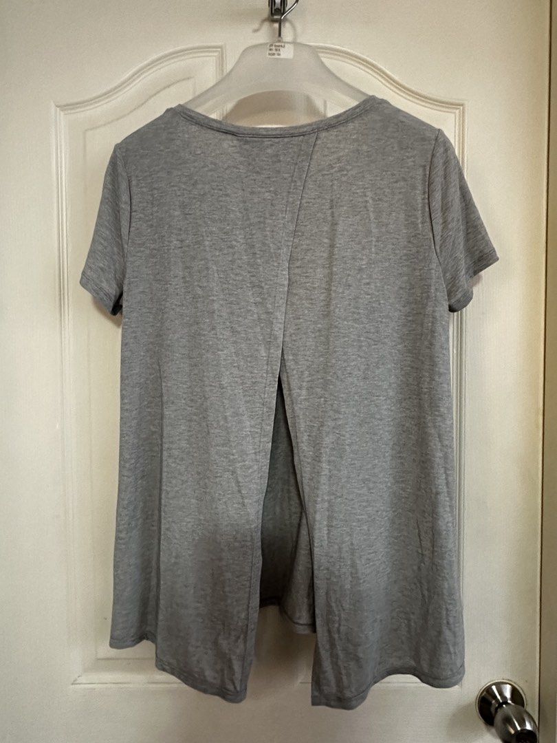 GAP Grey Breathe Open Back T-Shirt Size S (Category: Activewear) located in Manila. Submitted by nfcloset_ (Listing ID 1460793499, Image 1). Description: - Brand: Onesimus - Color: Grey - Size: S - Fabric: Lightweight and breathable - Design: Split back - Ideal for: Workouts or casual wear - Origin: Made in Vietnam.