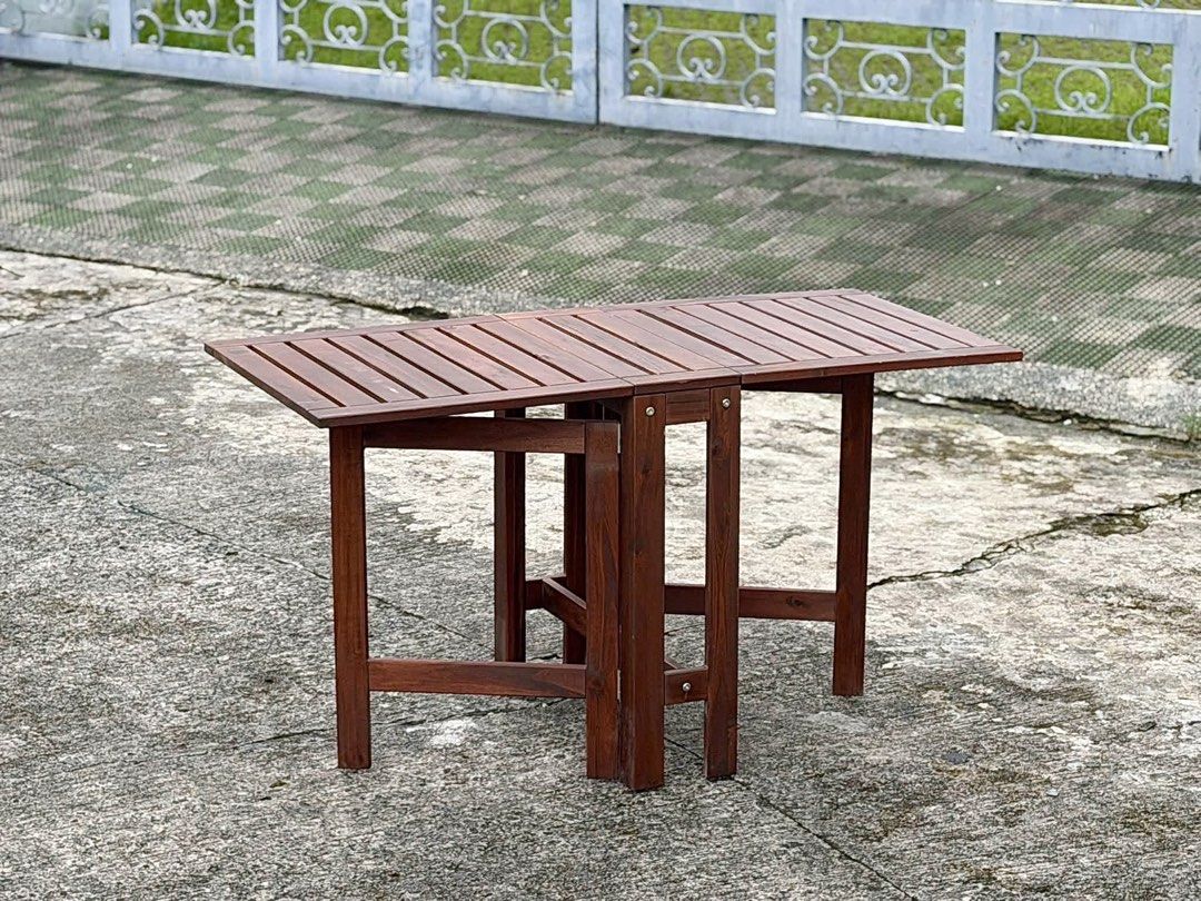 gateleg extendable folding table ~ brown stained Space-Saving Mechanism (Category: Tables & Sets) located in Bulacan. Submitted by rock_off.thriftshop.ph (Listing ID 1460740244, Image 2). Description: ÄPPLARÖ gateleg extendable folding table ~ brown stained Space-Saving Mechanism Features a double drop-leaf, gateleg design allowing it to adjust in size for 2 to 4 people.Material: Built from solid, durable wood with a dark brown stain designed to 