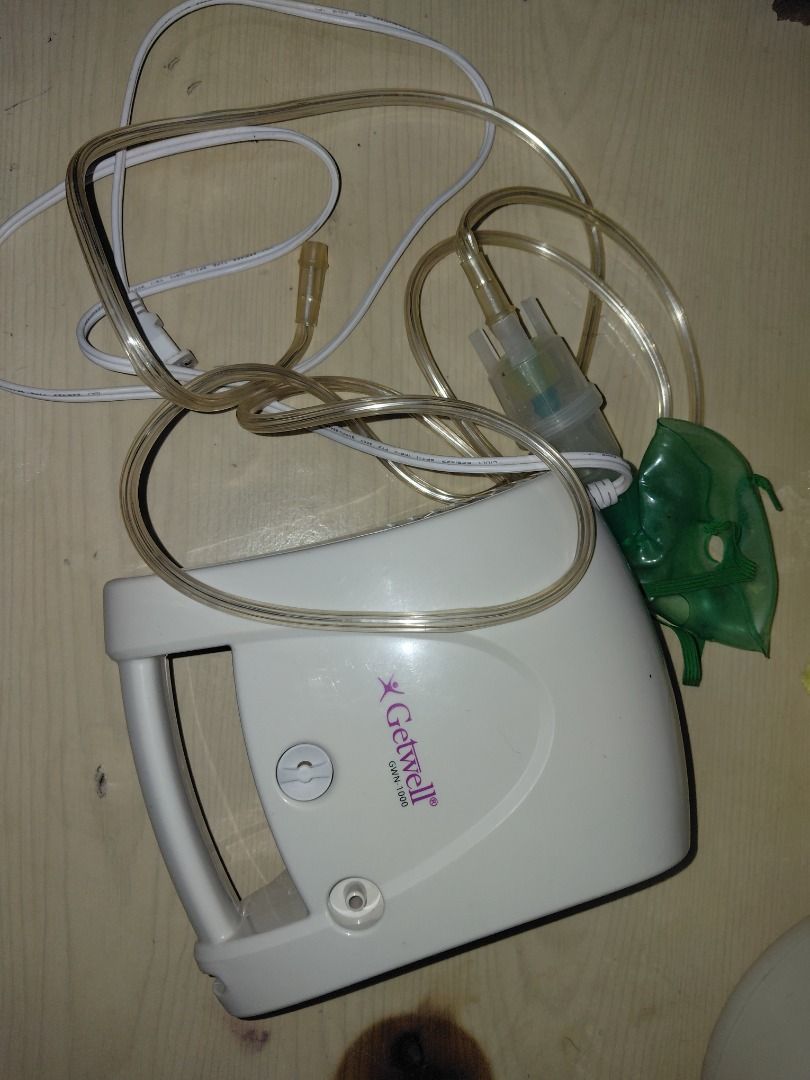 Getwell Nebulizer Machine with Carrying Bag (Category: Medical Supplies & Tools) located in Manila. Submitted by cosmicturtle.d1b615 (Listing ID 1460849945, Image 2). Description: - Getwell GW-200 Portable Nebulizer - Tested and working - Includes tubing and mask - Comes with a carrying case for easy transport - Attached power cord - Ideal for home respiratory treatments.