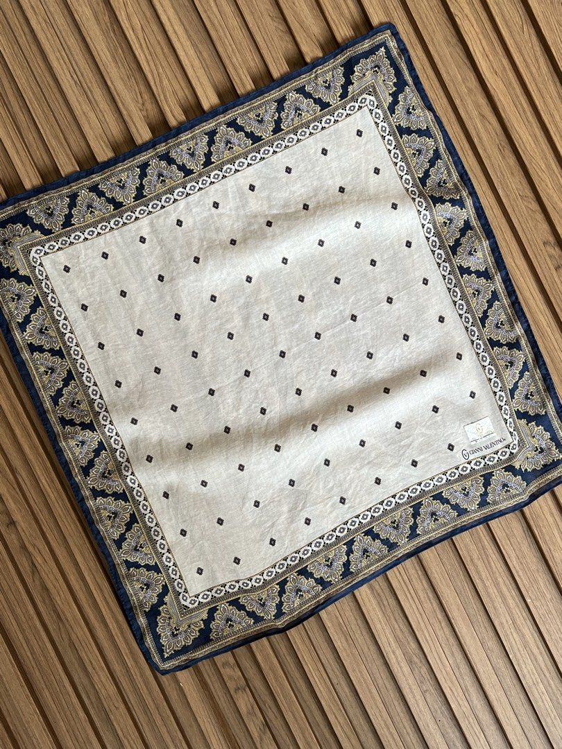 GIANNI VALENTINO - PAISLEY PATTERN HANDKERCHIEF (Category: Scarves) located in Bacolod City. Submitted by timelessbyjosh (Listing ID 1460899103, Image 3). Description: SIZE : ACTUAL COLOR : BLUE , GOLD & WHITE COLOR RATE : 10 OUT OF 10 CONDITION : EXCELLENT MATERIAL : MADE IN : FLAWS : NONE DIMENSIONS LENGTH - WIDTH - MEASUREMENT TAKEN WHILE LAYING FLAT..
