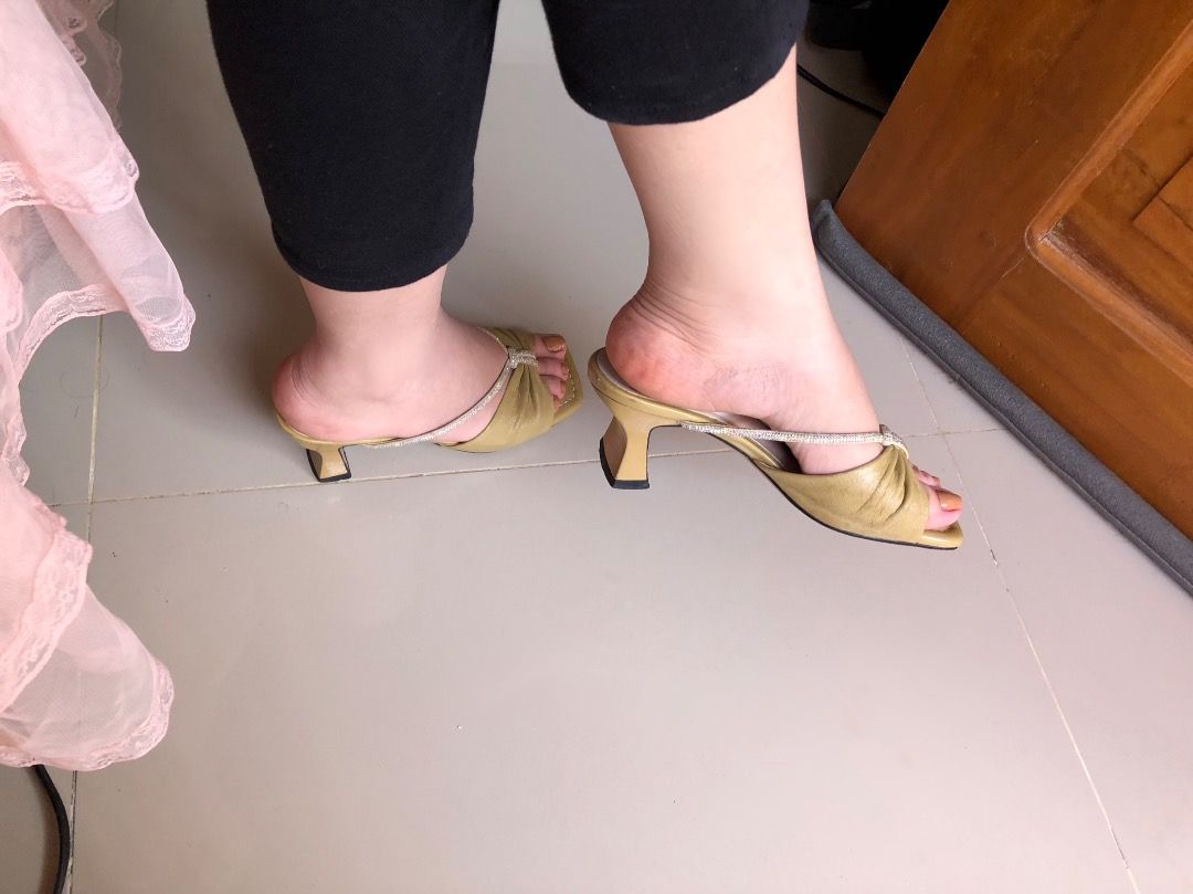 Gold Embellished Heeled Mules (Category: Heels) located in Davao. Submitted by christ07_fox (Listing ID 1460868026, Image 1). Description: - Chic gold heeled mules - Open toe with sparkly front strap embellishment - Low heel for comfortable wear - Easy slip-on style - Perfect for elevating any outfit.