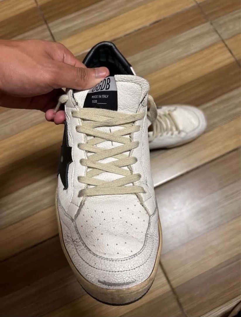 Golden Goose Ballstar 42 (Category: Casual Shoes) located in Manila. Submitted by johnpaul_moon (Listing ID 1460799271, Image 2). Description: Original 100% authentic minimal creases but overall shoe is good, bought from seoul. IF proven fake guarantee money back. One honest issue the insole is fake because nasira yung orig kaya mura ko lang ibebenta..