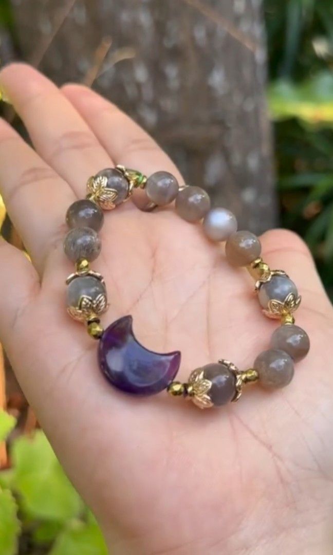 Gray Moonstone + Amethyst Moon Charm Bracelet (Category: Bracelets) located in Kinoguitan. Submitted by artemiscrystal (Listing ID 1460840952, Image 2). Description: - Gugan Moonstone HQ bracelet - Features an Amethyst Moon charm - Bead size: 10mm - Length: 16cm - Benefits: Peace, protection, better sleep, intuition, balance, inner peace -Freedown sizing -price: from 450 now 390 Visit us on FB/IG page for more products Artemis Crystal Jewelry,✨.