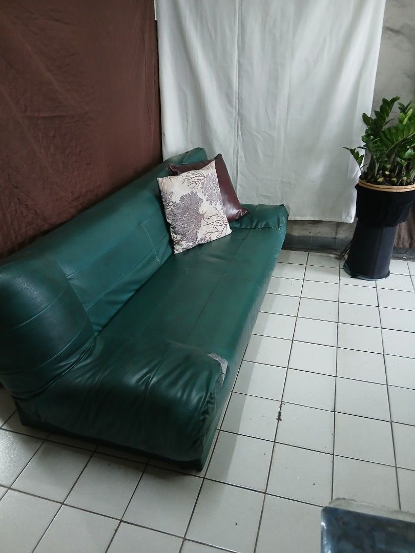 Green Faux Leather Sofa Bed with Storage (Category: Sofas) located in Dasmarinas. Submitted by tataysgarage (Listing ID 1454799362, Image 2). Description: 3-Seater Sofa Bed with 2 storage drawer. Foldable at 3 angles, Need re-upholstery and drawer repairs. Still functional as a sofa and bed. 6 ft long. Great for spare rooms ,garage, basement or student housing. Dasma Cavite Area.