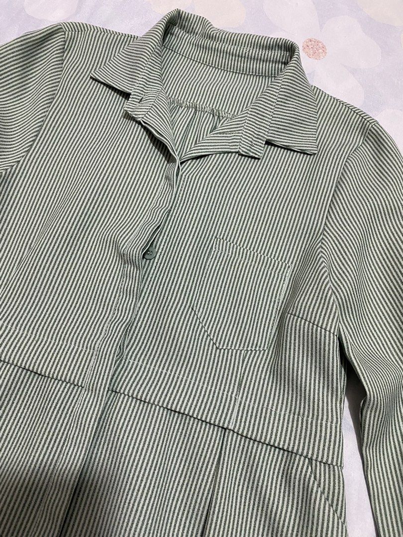 Green Striped Collared Long-Sleeve Dress (Category: Dresses) located in Tanza. Submitted by vhies_closet24 (Listing ID 1460868107, Image 2). Description: Pre-loved and gently used. Still in good condition. Classic collared style with long sleeves and green stripes—simple, classy, and easy to wear. 📌 Condition: Pre-loved / Good condition.