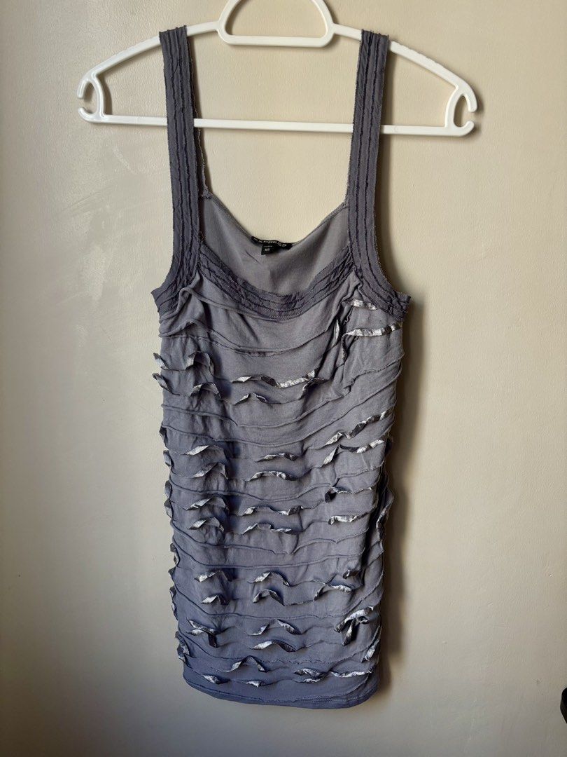 Grey Layered Ruffle Metallic Trim Y2K Sleeveless Statement Top (Category: Sleeveless) located in Cebu City. Submitted by joy_finds (Listing ID 1460771531, Image 1). Description: - can fit xs - thrifted; NO when worn - Payment via gcash qr - Delivery via J&T; SF shoulder by buyer .