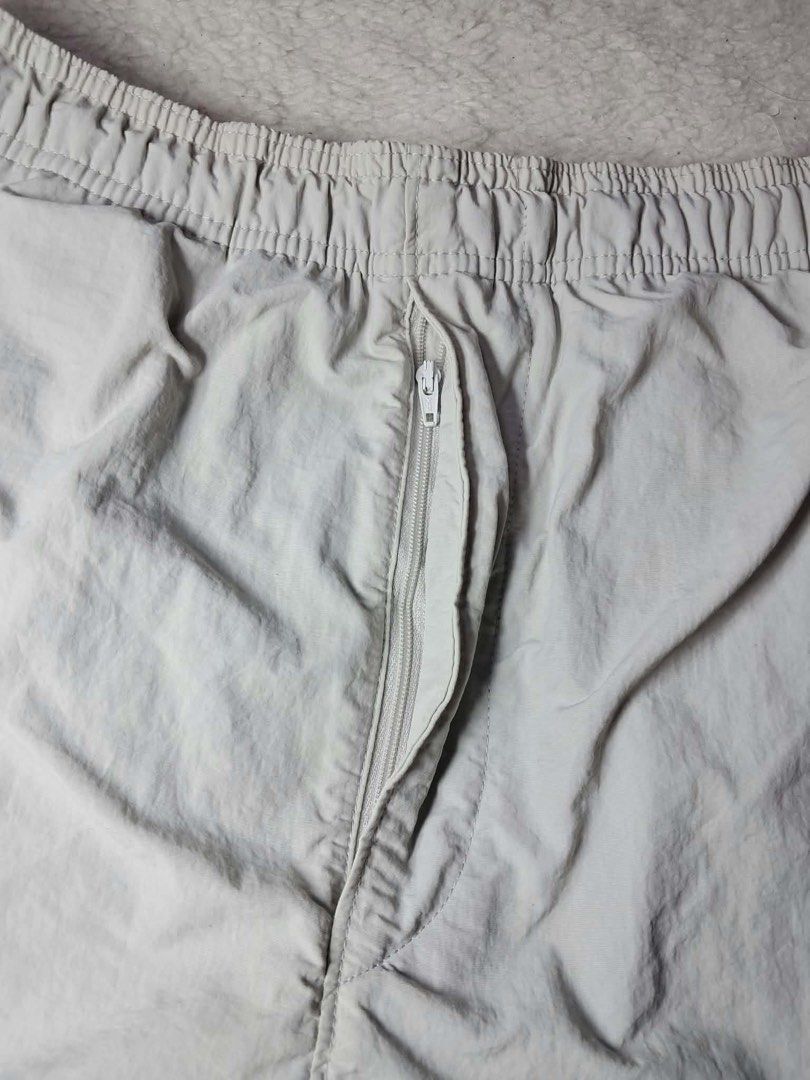 GU Warm Nylon Outdoor Pants Large Grey (Category: Joggers) located in Baguio. Submitted by padisellsz (Listing ID 1460820813, Image 3). Description: - GU Warm Nylon Track Pants - Very good condition - Size: Large - Fits Waist: 32-36 inches - Inseam: 27 inches - Rise: 15 inches - Thigh: 12.5 inches - Features: Zippered pocket, elastic waistband with drawstring, cuffed ankles with drawstring - Material: Lined with fleece for ultimate warmth - May l