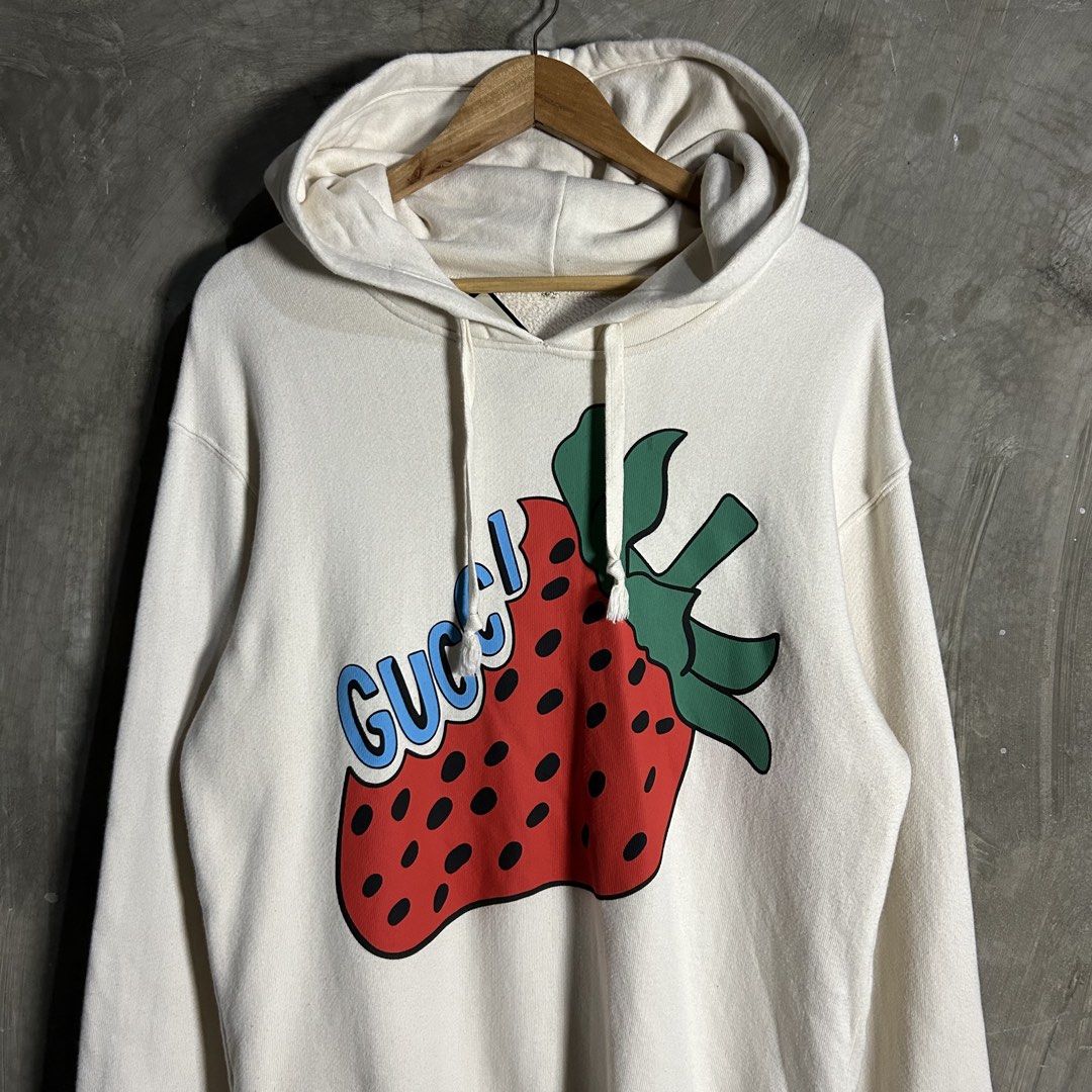 Gucci - Strawberry Pullover Hoodie (Category: Luxury Apparel) located in Tayabas. Submitted by streetdepartment (Listing ID 1460905120, Image 2). Description: Gucci - Strawberry Pullover Hoodie Measurements (inches): Width: 21” Length: 29” Tagged as XS fits Large Excellent condition Flaw/s: minor stain on print.