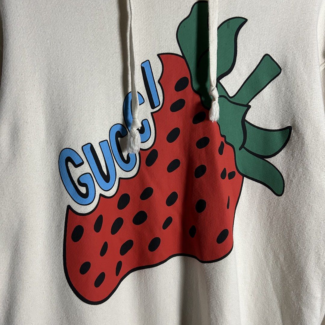 Gucci - Strawberry Pullover Hoodie (Category: Luxury Apparel) located in Tayabas. Submitted by streetdepartment (Listing ID 1460905120, Image 3). Description: Gucci - Strawberry Pullover Hoodie Measurements (inches): Width: 21” Length: 29” Tagged as XS fits Large Excellent condition Flaw/s: minor stain on print.