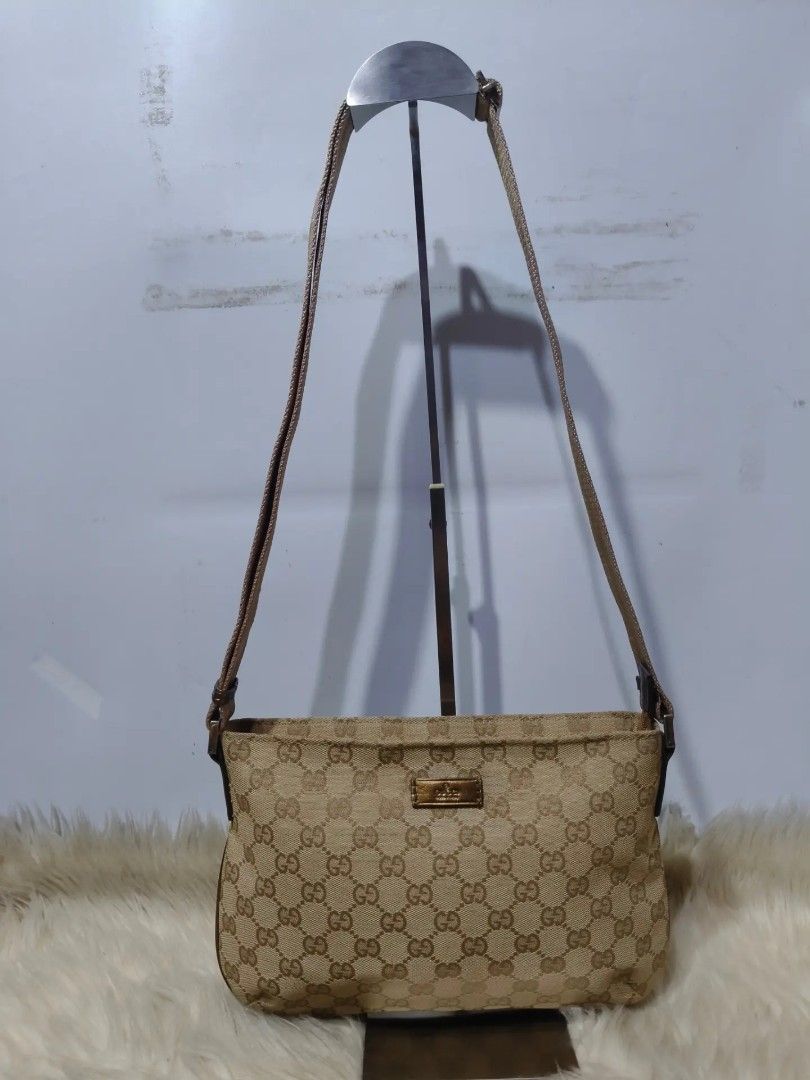 Gucci Monogram Shoulder Bag (Category: Shoulder Bags) located in Caloocan City. Submitted by secondhand_shop2 (Listing ID 1460794527, Image 1). Description: Sale❗Sale❗Sale❗ G U C C I sling bag Small size Canvas & genuine leather trim ykk zippers 📌First to pay!.