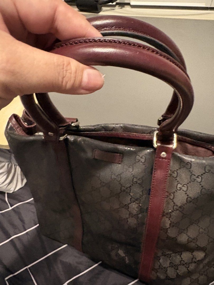 Authentic Gucci tote (Category: Tote Bags) located in Manila. Submitted by carolynba49610 (Listing ID 1460724139, Image 3). Description: Authentic Gucci Tote. Can fit laptop. Clean interior. No press marks, good edges. Condition 8/10. With papers.