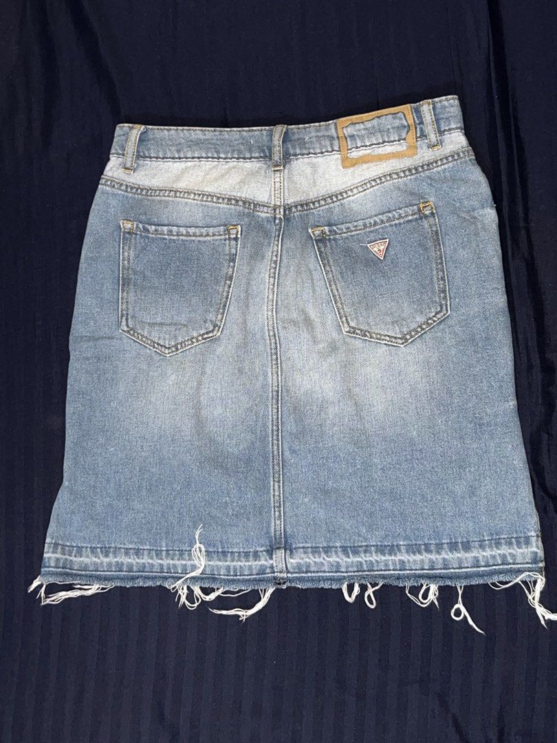 GUESS Skirt (Category: Skirts) located in Caloocan City. Submitted by mommycheadde (Listing ID 1460767698, Image 3). Description: Regular waist Slim fit 5-pocket model Zip and button fastening on the front Print detail on the front Fringed bottom 100% Cotton Machine wash 30° Denim weight 11.8 Oz. Size: US 27.