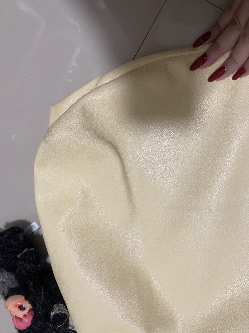 GVN hobo bag in butter (Category: Shoulder Bags) located in Paranaque City. Submitted by graceshanp (Listing ID 1460883330, Image 3). Description: - Cream colored shoulder bag - Made of faux leather - Zipper closure for security - Light-colored fabric lining - Comfortable wide strap - Adorable plush charm included - Ideal for everyday wear LP ALREADY! .