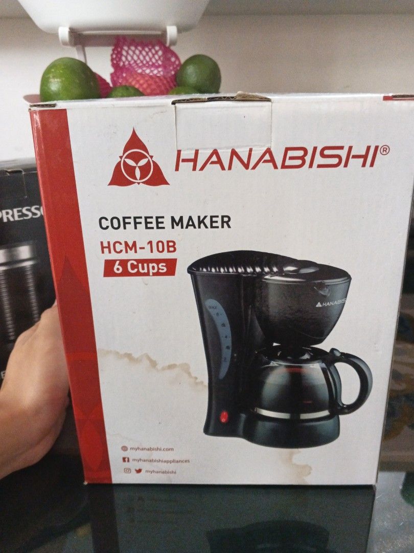 Hanabishi Coffee Maker HCM-10B 6 Cups (Category: Coffee Machines & Makers) located in Caloocan City. Submitted by randomthingsfromme (Listing ID 1460748174, Image 3). Description: - Hanabishi Coffee Maker, Model HCM-10B - Makes up to 6 cups of coffee - Features a durable glass pitcher - Convenient swing-out filter basket - Easy-to-read water level indicator on the side - Rated voltage: 230V - Comes with original packaging - Ideal for your morning