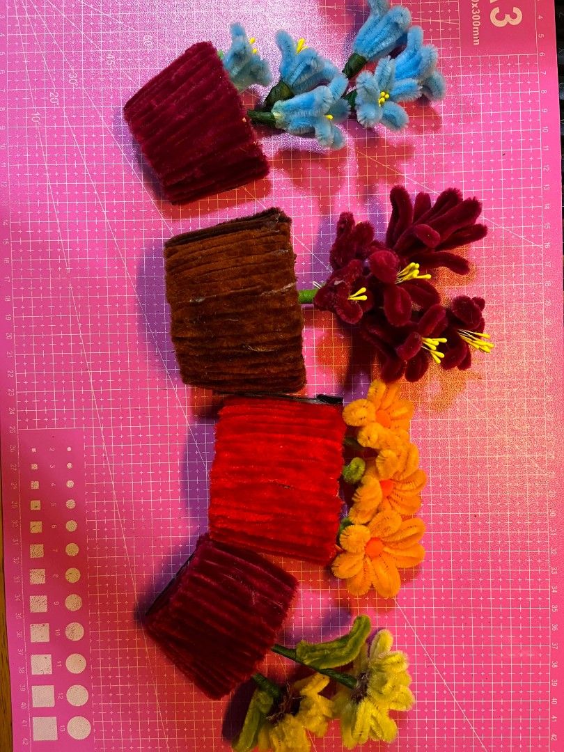 Handmade Pipe Cleaner Flower Pots with Flowers (Category: Pots & Planters) located in Manila. Submitted by zeal.mari62 (Listing ID 1460914673, Image 2). Description: - Handmade flower pots crafted from colorful pipe cleaners. - Each pot features a unique flower color. - Ideal for desk decoration or as a charming small gift. - Adds a unique and colorful touch to any space. - Available as a set or individually..