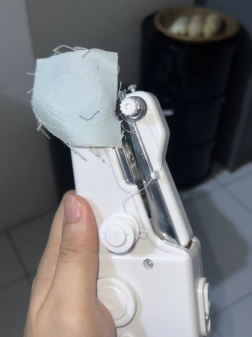 Handy Stitch Handheld Sewing Machine (Category: Craft Supplies & Tools) located in Manila. Submitted by asa68984 (Listing ID 1460881480, Image 2). Description: - Portable and battery-powered for convenience - Ideal for quick repairs and small sewing projects - Capable of sewing through denim and other fabrics - Also suitable for delicate materials - Easy to use for beginners - Free bonus item included!.