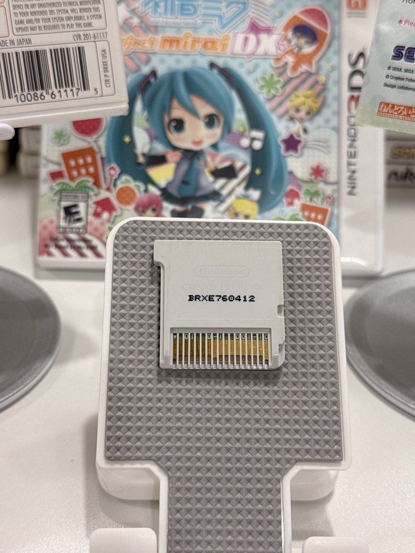 Hatsune Miku: Project Mirai DX 3DS/2DS Game (Category: In-Game Products) located in Baliuag. Submitted by mostlyaboutnintendo (Listing ID 1460913025, Image 3). Description: 📌 https://linktr.ee/mostlyaboutnintendo 📢 COMPLETE IN CASE AND MANUAL/s ✔️ Authentic ✔️ Mabilis ma-read mismong cartridge ✔️ Guaranteed tested and working ✔️ Will always send tested pics before ship out ✔️ Clean Pins ✔️ US Version Hatsune Miku: Project Mirai DX brings the po