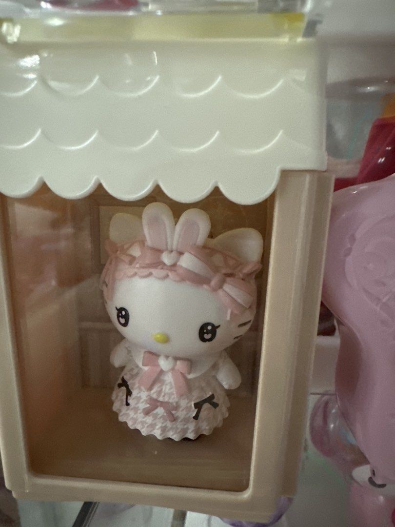 Hello Kitty Figure (Category: Figurines & Statues) located in Manila. Submitted by lunalux09 (Listing ID 1460805046, Image 1). Description: - Adorable Kitty figurine - Dressed in a pink lace bunny outfit - Comes with a charming house playset - Features a scalloped roof detail - Ideal for Kitty collectors - Makes a lovely decorative piece - Perfect gift for any Kitty fan.