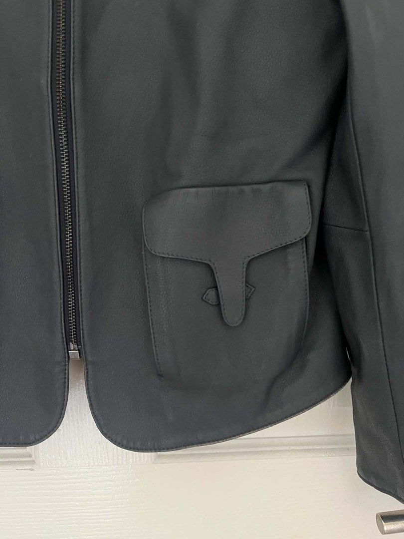 Hermes H Collarless Navy Blue Leather Jacket (Category: Luxury Apparel) located in Muntinlupa City. Submitted by thevintageeditbyashley (Listing ID 1460741828, Image 3). Description: -Size is small, fits xs-medium -Has no more tags -No flaws -The Row, Loro Piana, Loewe, Brunello Cucinelli, Toteme, Delvaux, Valextra, Moynat, Bottega Veneta, Berluti, Kiton, Zegna, Giorgio Armani, Ralph Lauren, Max Mara, Jil Sander, Lemaire, Massimo Dutti, Zara, Tod