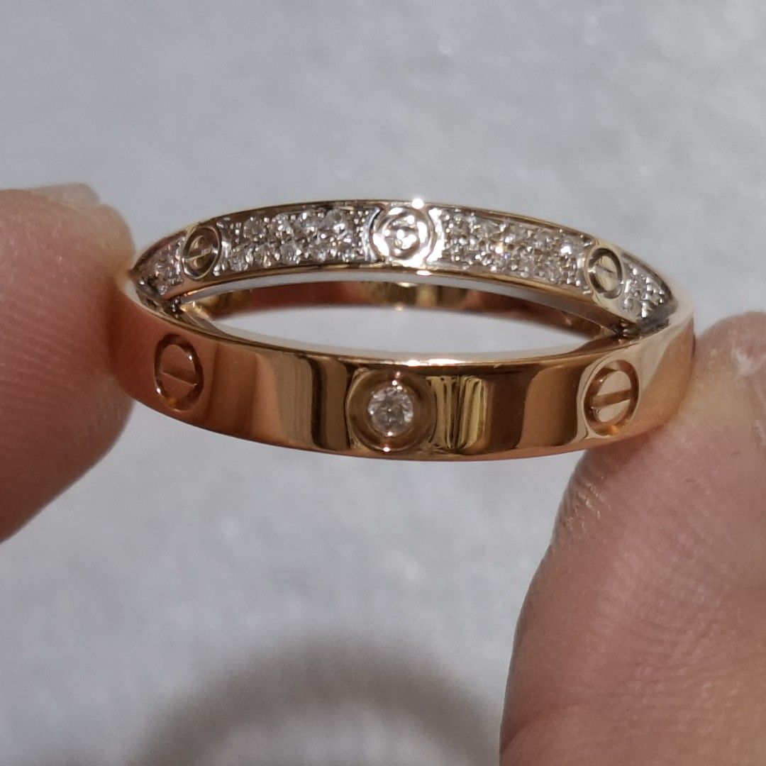 Hk Setting 18k Two Tone Cartier Diamond Ring (Category: Rings) located in Manila. Submitted by treasurechest888 (Listing ID 1460751001, Image 2). Description: Video available upon request! Preowned Hk setting Cartier L0ve diamond 18k two tone gold double band ring (approx .20ct, 8.90 grams, size 8.25). Only 86,500 pesos. Pwede COD or COP ng LBC with 5,000 pesos downpayment..