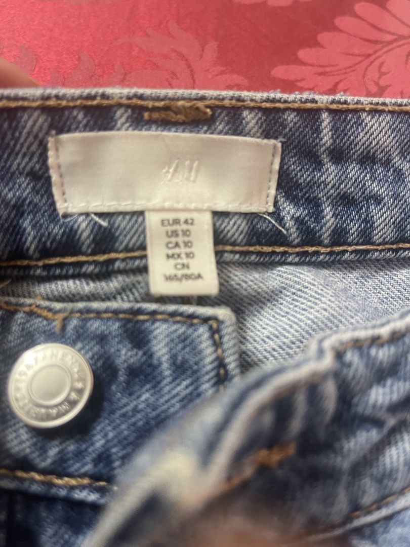 H&M Blue Denim Jeans Size US 10 (Category: Jeans) located in Paranaque City. Submitted by politzki (Listing ID 1460786683, Image 2). Description: - Brand: H&M - Style: Straight Leg Jeans - Color: Blue Denim - Closure: Button and Zip - Pockets: Front and Back - Fit: Comfortable - Occasion: Casual Wear.