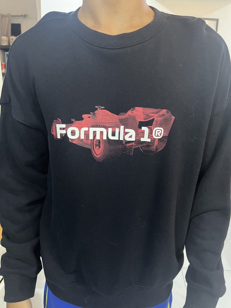 H&M Formula 1 Oversized Fit Black Sweatshirt (Category: Coats, Jackets and Outerwear) located in Manila. Submitted by mikeezs (Listing ID 1460763897, Image 1). Description: - Black H&M Sweatshirt - Features a cool Formula 1 graphic - Oversized fit - Size: Medium - Ideal for casual wear - Comfortable and stylish - Perfect for F1 enthusiasts.