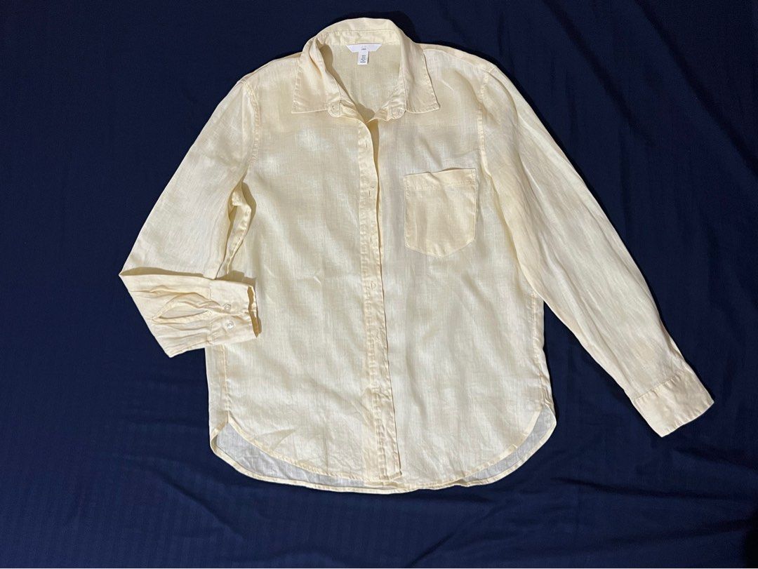 H&M Linen Shirt (Category: Shirts) located in Caloocan City. Submitted by mommycheadde (Listing ID 1460771143, Image 1). Description: - Light yellow H&M linen shirt - Long sleeves with button cuffs - Single chest pocket - Button-up front - Ideal for casual wear or layering.