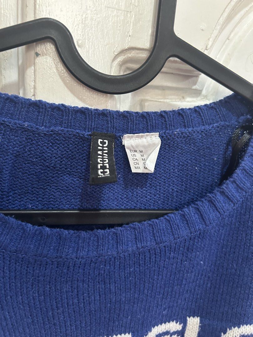 H&M Sweater (Category: Coats, Jackets and Outerwear) located in Meycauayan. Submitted by ms.einz (Listing ID 1460768161, Image 2). Description: - Cute blue sweater from Divided by H&M - Features a fun sloth graphic - Text reads "Take It Slow In The Snow" - Ribbed cuffs and hem - Ideal for casual wear or holiday events - Size: Medium #h&m.