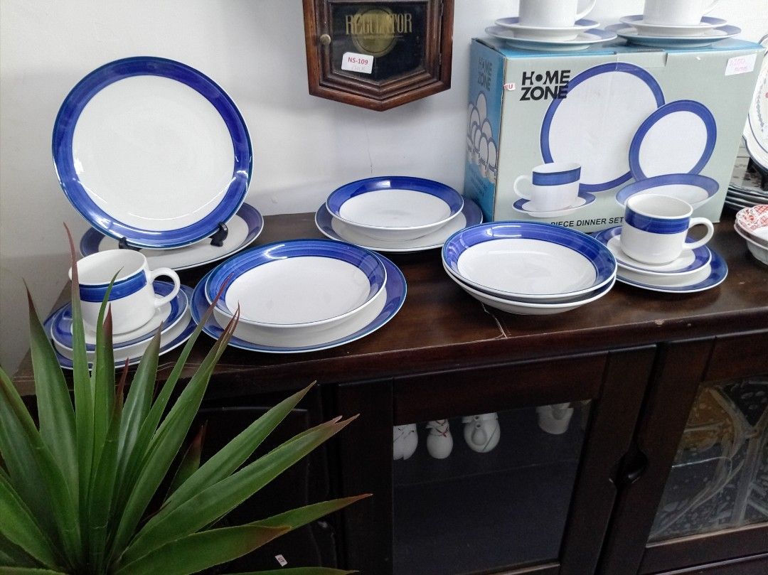 Home Zone Blue Rimmed Dinnerware Set (Category: Dinnerware & Cutlery) located in Manila. Submitted by keenhorse.30d35c (Listing ID 1460769839, Image 1). Description: - Home Zone 20-piece dinnerware set - White plates and bowls with a classic blue rim - Includes matching cups and saucers - Ideal for everyday dining and special occasions - Some pieces are displayed outside the original box.