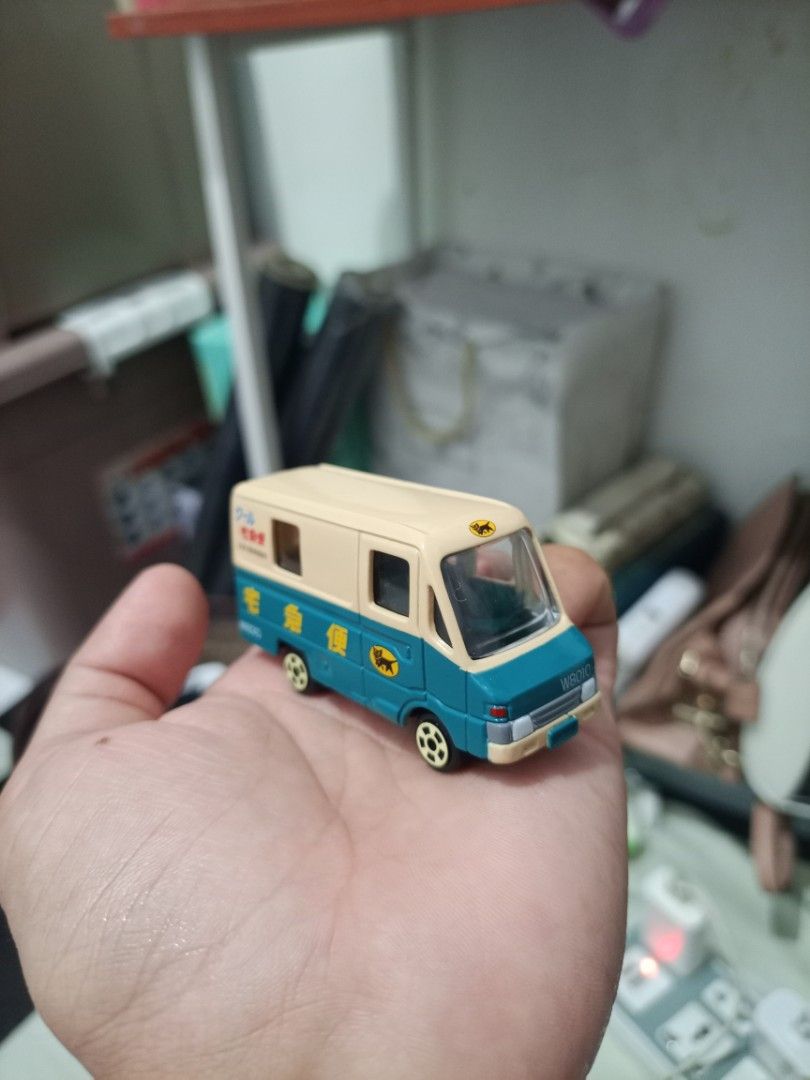 Hot Wheels / Diecast, 200 each (Category: Vehicle & Diecast Models) located in Manila. Submitted by warmcrystal_269010 (Listing ID 1460901669, Image 2). Description: - Set of 2 die-cast metal toy cars - Includes a blue Tomica lowloader truck - Includes a beige and blue mail van with Japanese text and logo - Great for collectors or kids who love vehicles.