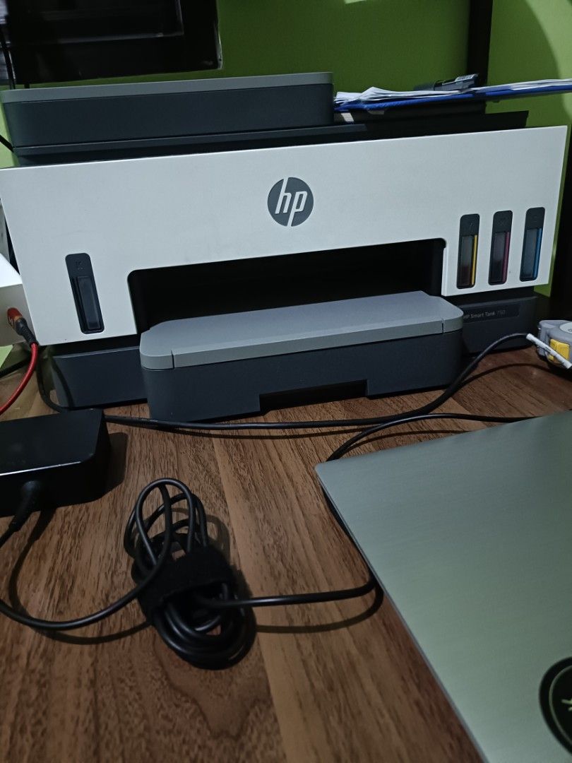 HP Smart Tank 750 Printer (Category: Printers, Scanners & Copiers) located in Lapu Lapu. Submitted by cortesvitor1486 (Listing ID 1460862121, Image 1). Description: - HP Smart Tank 750 All-in-One Printer - Features visible ink tanks for easy monitoring - Comes complete with power adapter and cables - Ready for all your printing, scanning, and copying needs - Ideal for both home and office environments.