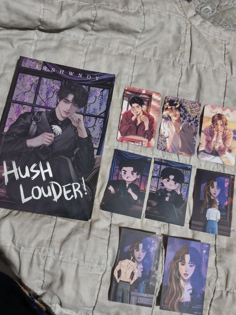 Hush Louder! By irshwndy Vien version (Category: Storybooks) located in Naga. Submitted by fluttershaiii (Listing ID 1460725323, Image 3). Description: - Novel: Hush Louder! by IRSHWNDY - Genre: Mystery-thriller, suspense, investigation - Includes: Several character photocards - Author of: Knock, Knock, Professor - Perfect for: Fans of Wattpad stories.