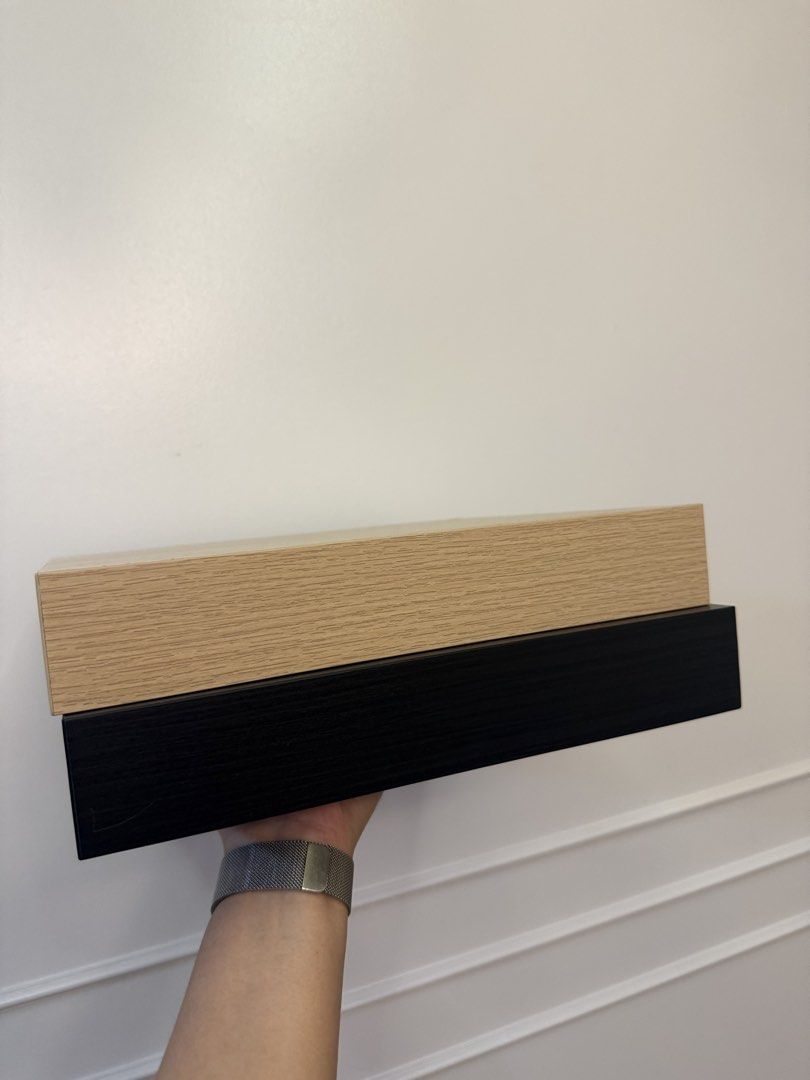 Ikea lack shelves (Category: Home Improvement Tools & Accessories) located in Pasig City. Submitted by affordablestuffph (Listing ID 1460886775, Image 2). Description: White oak stained and black. Walang kasamang nails na pagsabitan similar to how it was bought from Ikea. No issues or scratches for both shelves..