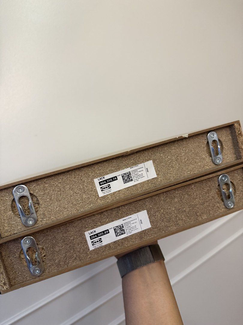 Ikea lack shelves (Category: Home Improvement Tools & Accessories) located in Pasig City. Submitted by affordablestuffph (Listing ID 1460886775, Image 3). Description: White oak stained and black. Walang kasamang nails na pagsabitan similar to how it was bought from Ikea. No issues or scratches for both shelves..
