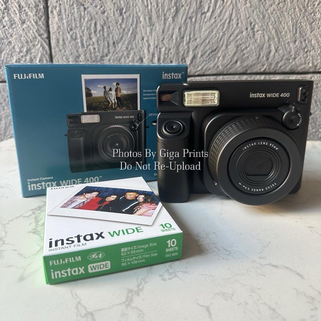 Instax Wide 400 In Jet Black (Category: Cameras) located in Quezon City. Submitted by bdsdc1998 (Listing ID 1460724553, Image 1). Description: FUJIFILM INSTAX WIDE 400 JET BLACK 🖤🖤🖤 SRP: 10,599 SALE PRICE: 9,499 🎁INCLUSIONS: -10 Sheets Wide Plain Film -Unit -Camera Angle Adjustment Accessory -Closeup Lens -Shoulder Strap -Batteries -Users Manual -Warranty Papers.