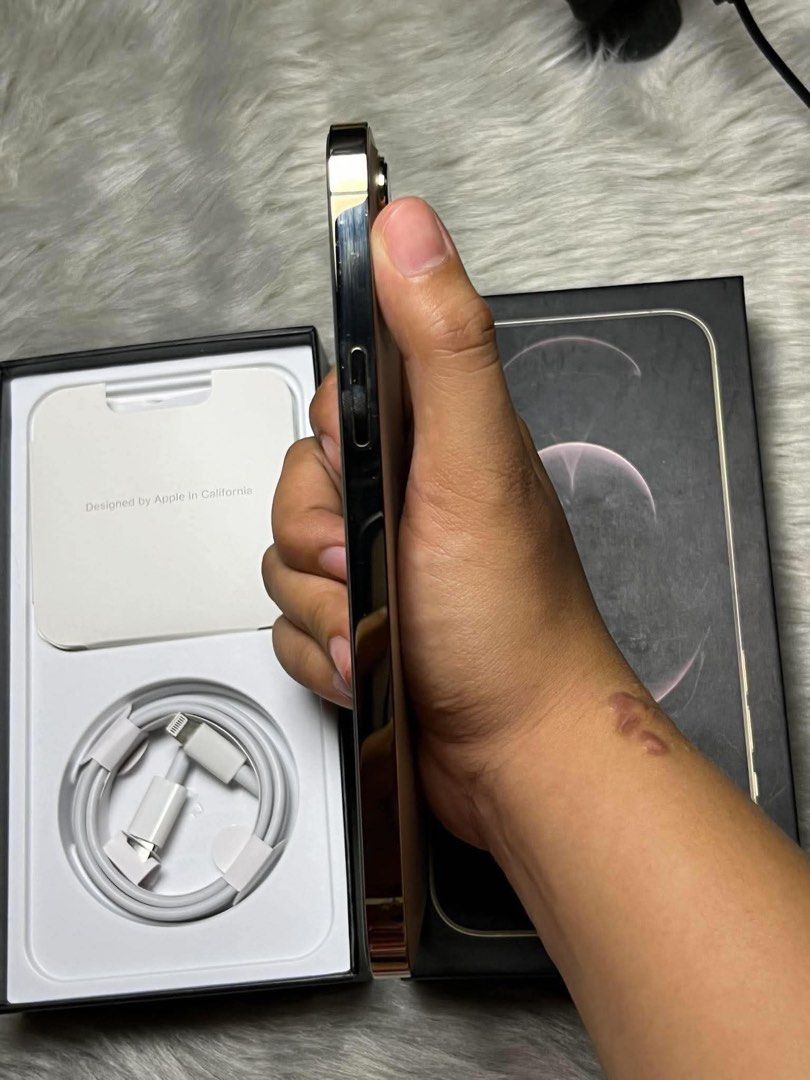 iPhone 12 promax (Category: iPhone 12 Series) located in Manila. Submitted by ashley_238 (Listing ID 1460733636, Image 2). Description: FOR SALE! iPhone 12 pro max (rose gold) -open for swap ios to ios 128GB Factory Unlocked Zp/a local purchased 🇵🇭 87% Battery Health No hidden issue No history of repair Unli check upon meet up ;minimal dents only Inclusion: unit, replacement box, case and cord 📍BULACAN.