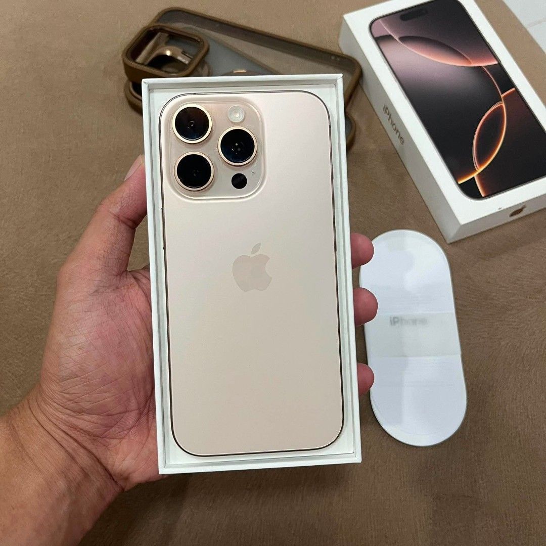 iPhone 16 pro (Category: iPhone 16 Series) located in Manila. Submitted by athannnn (Listing ID 1460721980, Image 3). Description: iPhone 16 Pro Desert titanium factory unlocked (any sim) ZP/A Local variant batt health 93% orig makunat No history of repair / Not refurbished Mint condition No issue! complete package ₱ 30,000 Pesos only..