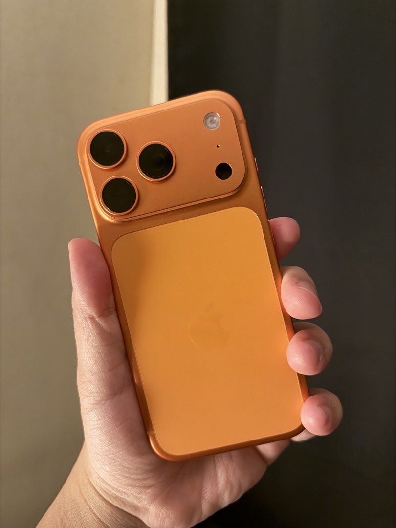 iPhone 17 Pro Cosmic Orange 256gb (Category: iPhone 17 Series) located in Quezon City. Submitted by acaded96 (Listing ID 1460872877, Image 1). Description: iPhone 17 Pro (Cosmic Orange, 256gb) 96% battery health 275 Cycle Count Under limited warranty until Nov 9 2026 Bought at Beyond the Box VMall 99% smooth no dents.