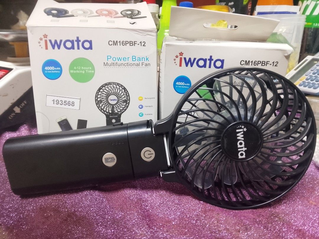 Iwata Power Bank Multifunctional Fan (Category: Travel Essentials & Accessories) located in Manila. Submitted by psy.09 (Listing ID 1460838145, Image 1). Description: 550 each 1k if you get both black and dark blue colors.