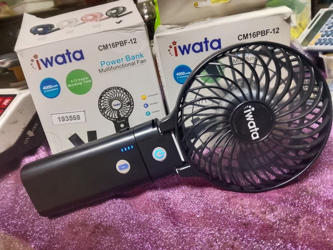 Iwata Power Bank Multifunctional Fan (Category: Travel Essentials & Accessories) located in Manila. Submitted by psy.09 (Listing ID 1460838145, Image 2). Description: 550 each 1k if you get both black and dark blue colors.