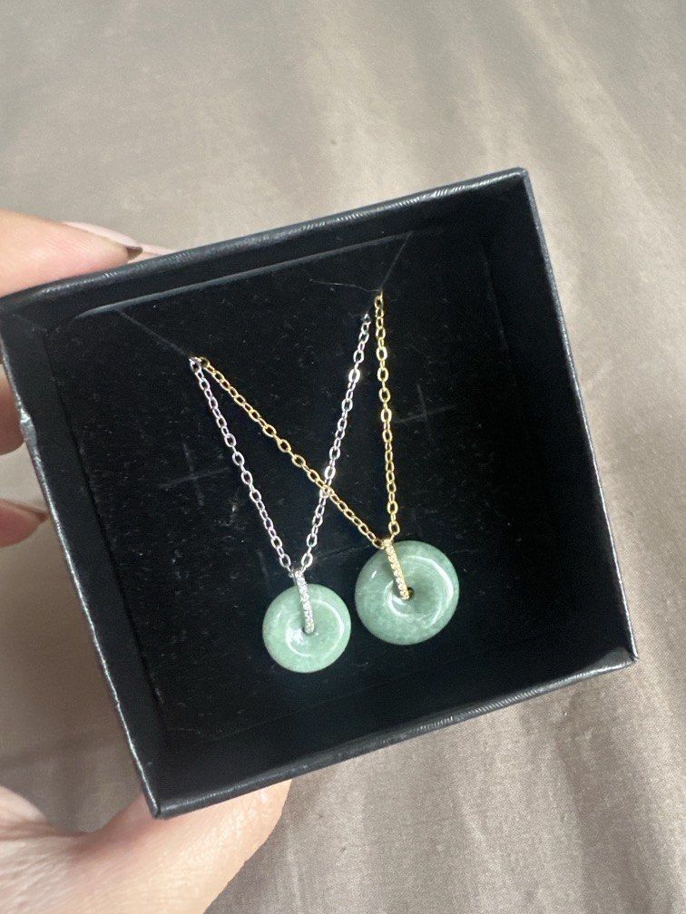 Jade donut necklace (Category: Necklaces) located in Quezon City. Submitted by _shopsnatched88 (Listing ID 1460751956, Image 2). Description: Stainless Jade donut comes with certificate grade A oil green Gold tone - 850 (big) ❌SOLD❌ Silver tone - 850 (big) - see last photo Silver tone - 650 (smaller) ❌SOLD❌.