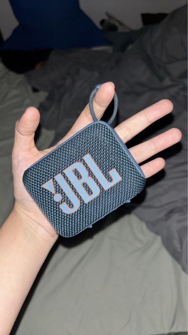 JBL GO4 (Category: Soundbars, Speakers & Amplifiers) located in Caloocan City. Submitted by goldengem-c27ad6 (Listing ID 1460853428, Image 3). Description: - Brand: JBL - Model: GO4 - Type: Portable Bluetooth Speaker - Design: Compact and stylish with a textured grille - Features: Built-in loop for easy carrying.