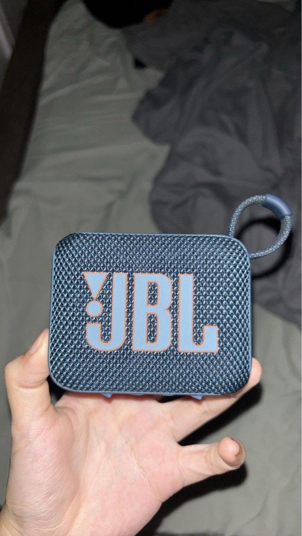 JBL GO4 (Category: Soundbars, Speakers & Amplifiers) located in Caloocan City. Submitted by goldengem-c27ad6 (Listing ID 1460853428, Image 1). Description: - Brand: JBL - Model: GO4 - Type: Portable Bluetooth Speaker - Design: Compact and stylish with a textured grille - Features: Built-in loop for easy carrying.